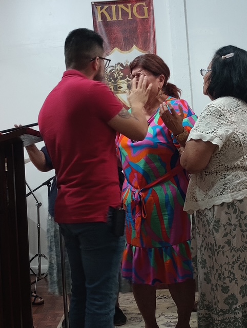Prayer during service at Sevenfold Spirit Ministries